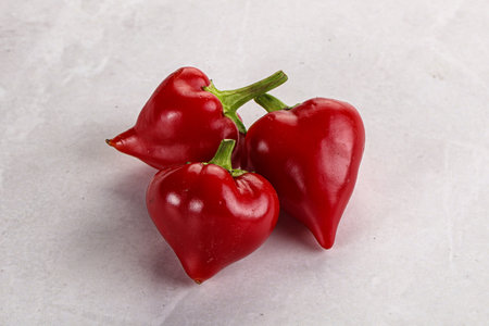 Red spicy cherry organic pepper heapの写真素材