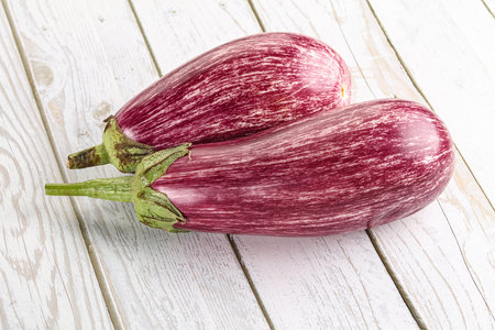 Two Ripe purple graffiti eggplant for cookingの写真素材