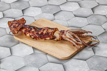 Dietary seafood - grilled squid in the plateの写真素材