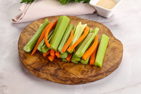 Vegan cuisine - dietary celery and carrot cticks snackの写真素材