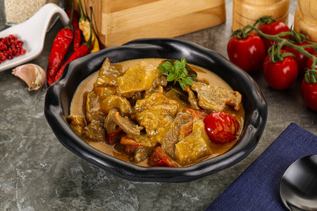 Yellow THai curry with beef and vegetablesの写真素材