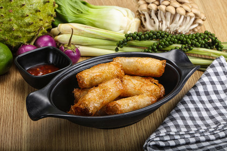 Vietnamese cuisine fried stuffed spring roll with sauce