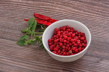 Red pepper aroma seeds in the bowlの写真素材