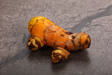 Fresh curcuma root isolated for cookingの写真素材