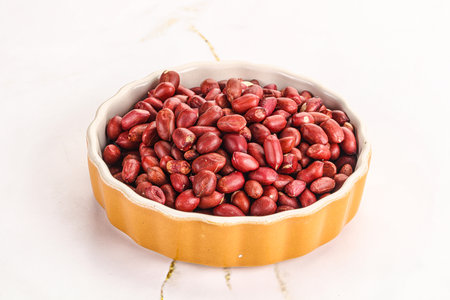 Raw ripe peanut heap for roast