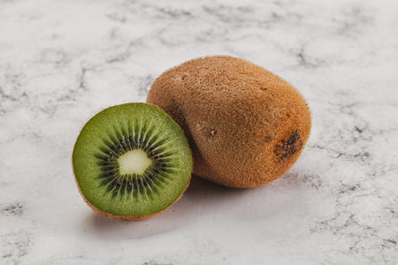 Sweet and juicy kiwi fruit with sliceの写真素材