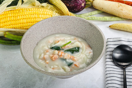 Soup with prawn, spinach and noodleの写真素材