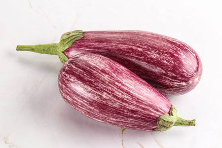 Two Ripe purple graffiti eggplant for cookingの写真素材