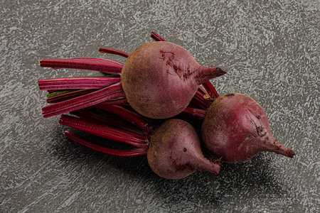 Young raw organic beetroot heap isolatedの写真素材