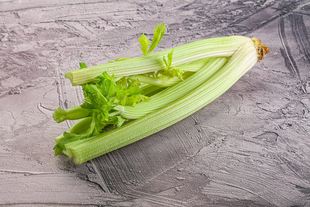 Vegan cuisine - raw green celery stemの写真素材