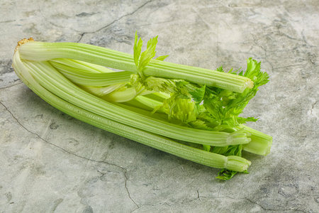 Vegan cuisine - raw green celery stemの写真素材