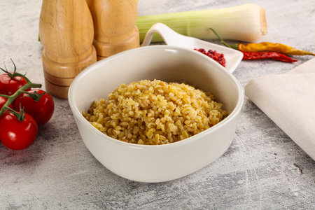 Boiled bulgur wheat in the bowl garnishの写真素材