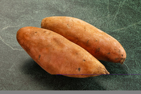 Raw ripe batat root for bakedの写真素材