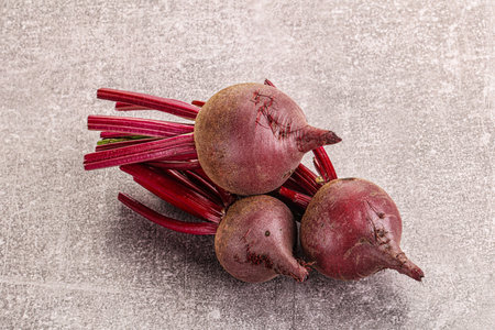 Young raw organic beetroot heap isolatedの写真素材