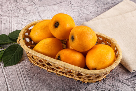 Ripe sweet juicy medlar fruit heapの写真素材