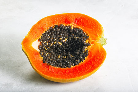 Tropical exotic sweet fruit - Papaya with seedsの写真素材