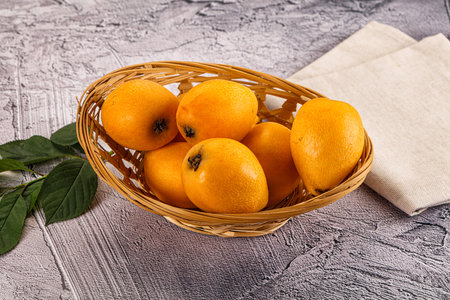 Ripe sweet juicy medlar fruit heapの写真素材