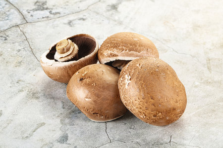 Raw brown champignon heap for cookingの写真素材