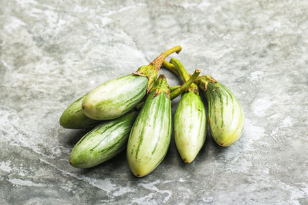 Small organic young green eggplant heapの写真素材