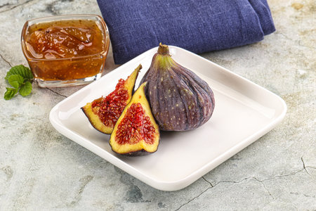 Purple ripe sweet fig with cutの写真素材