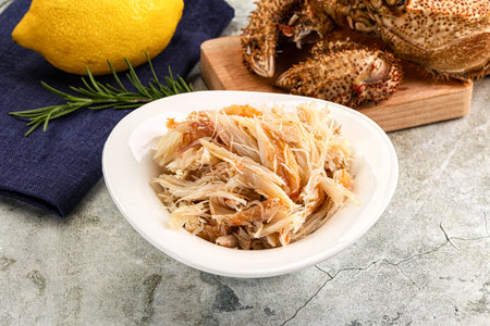 Wild natural crab meat for salad served lemon