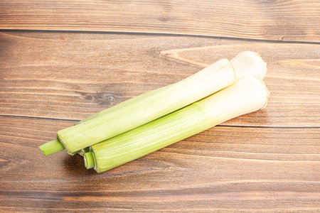 Raw natural ripe organic green leek onionの写真素材