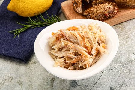 Wild natural crab meat for salad served lemon