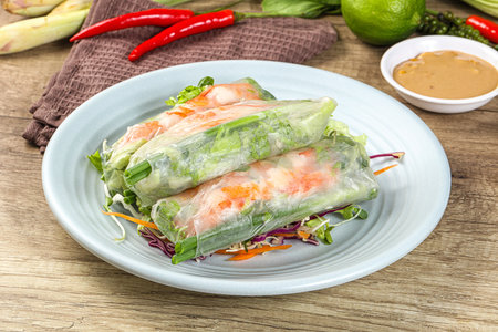 Vietnamese spring roll with prawn, carrot and saladの写真素材