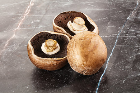 Raw brown champignon heap for cookingの写真素材