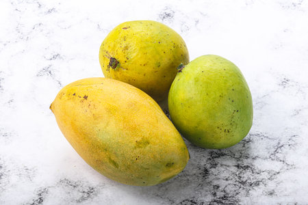 Fresh sweet and juicy tropical mango heapの写真素材