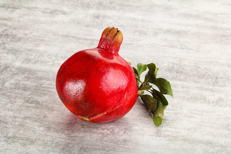 Ripe red sweet and juicy Pomegranate fruitの写真素材