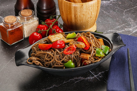 Wok Buckwheat Soba with eel and vegetablesの写真素材