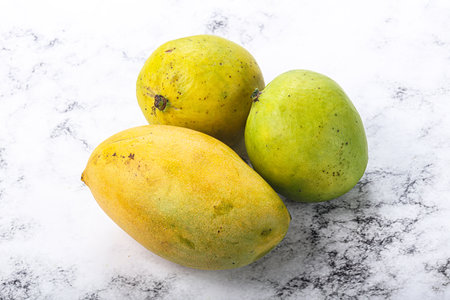 Fresh sweet and juicy tropical mango heapの写真素材
