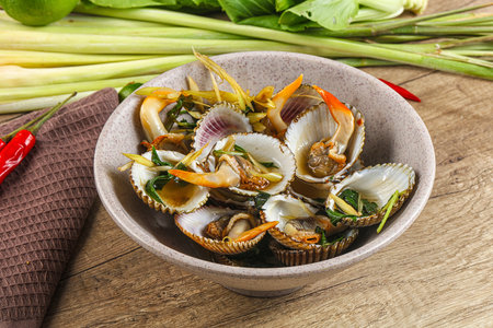 Delicious Asian mollusk shell steamed with spicesの写真素材