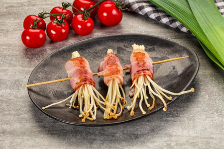 Grilled enoki mushroom with bacon roll wrapの写真素材