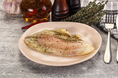 Baked tilapia fish fillet with spices