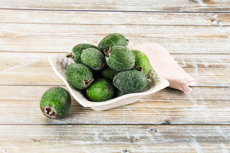 Sweet ripe juicyfruit feijoa in the bowlの写真素材