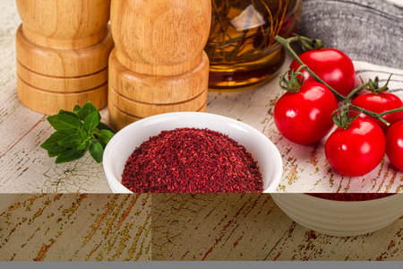 Natural organic Sumah powder for culinary in the bowl