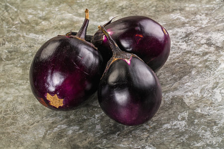 Raw ripe violet and black eggplantの写真素材