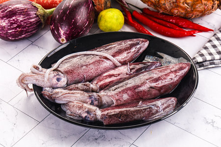 Raw fresh young squid for cookingの写真素材