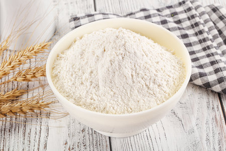 White Wheat flour heap for bakeの写真素材