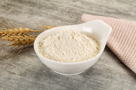 Wheat flour powder for cooking in the bowlの写真素材
