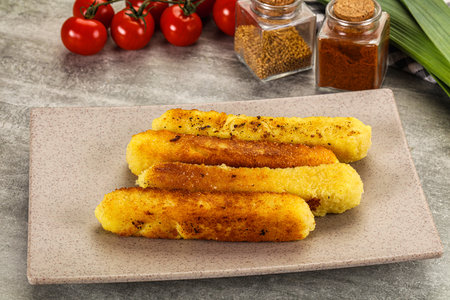Crispy breaded mozarella cheese sticks appetizer