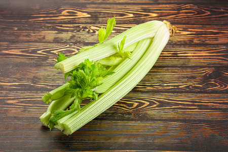 Vegan cuisine - raw green celery stemの写真素材