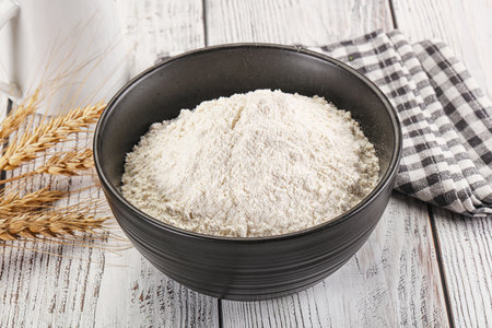 White Wheat flour heap for bakeの写真素材