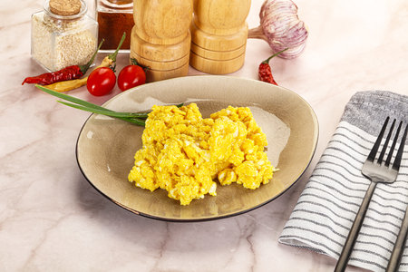 Scrambled egg in the bowl for breakfastの写真素材