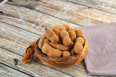 Tropical exotic Tamarind fruit heap beansの写真素材