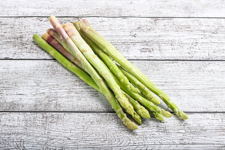 Raw green delicous uncooked asparagus sproutの写真素材