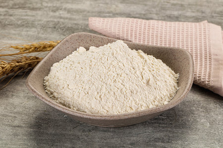Wheat flour powder for cooking in the bowlの写真素材