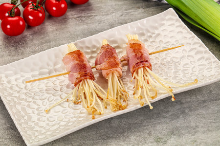 Grilled enoki mushroom with bacon roll wrapの写真素材